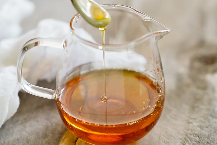 Caramel sauce in a small glass jug