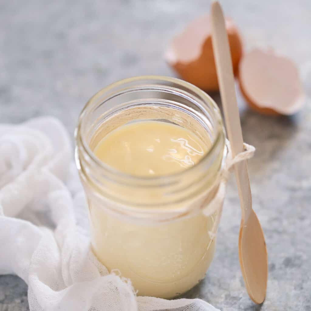 homemade mayonnaise in a small mason jar
