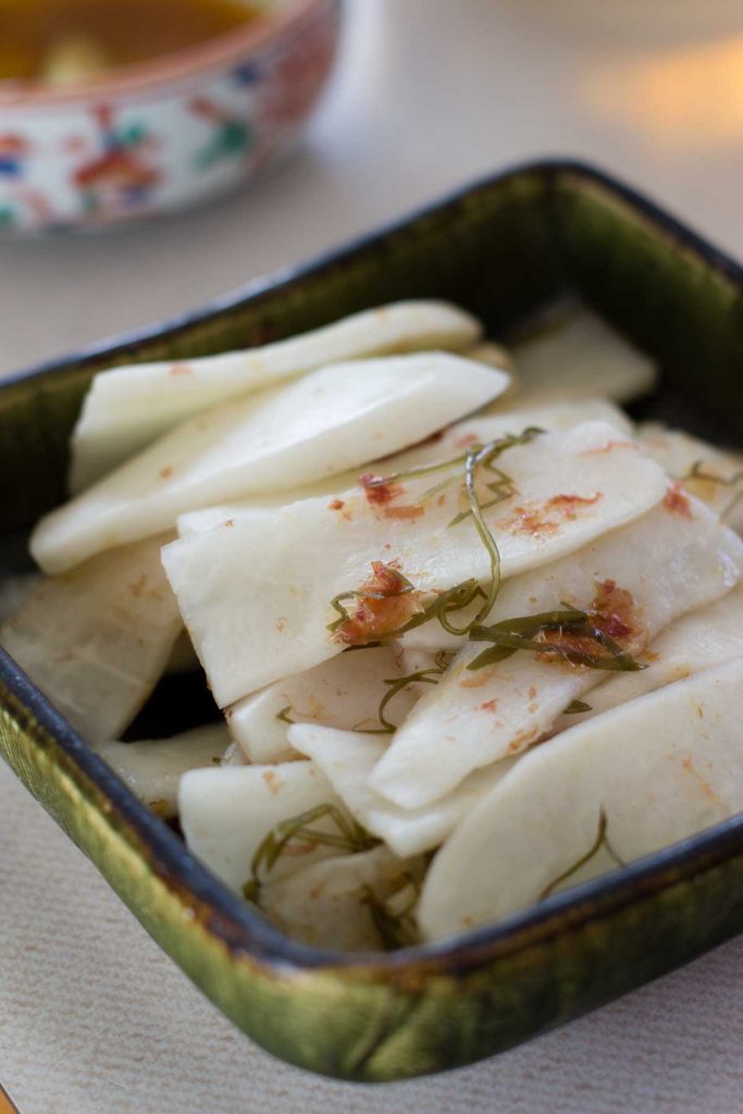 my aunt Keiko's pickled daikon served on table
