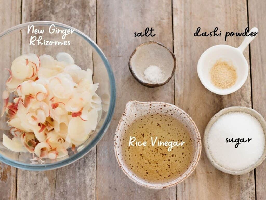 washed and sliced new ginger rhizomes in a bowl, rice vinegar, sugara, salt and dashi powder in small bowls 
