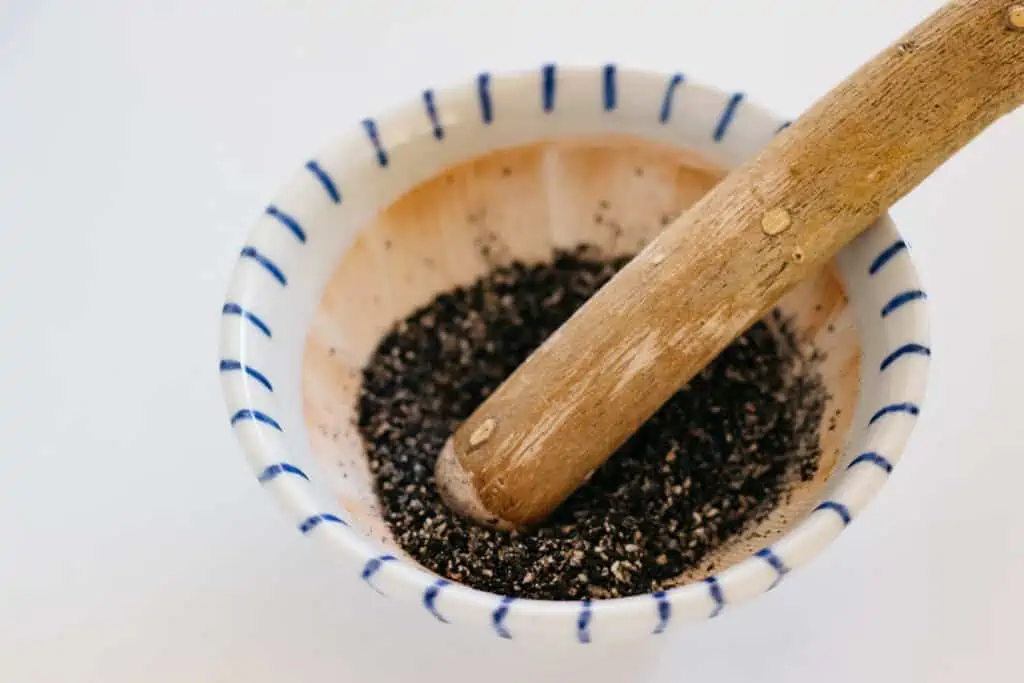 black sesame seeds in a Japanese ceramic mortar 