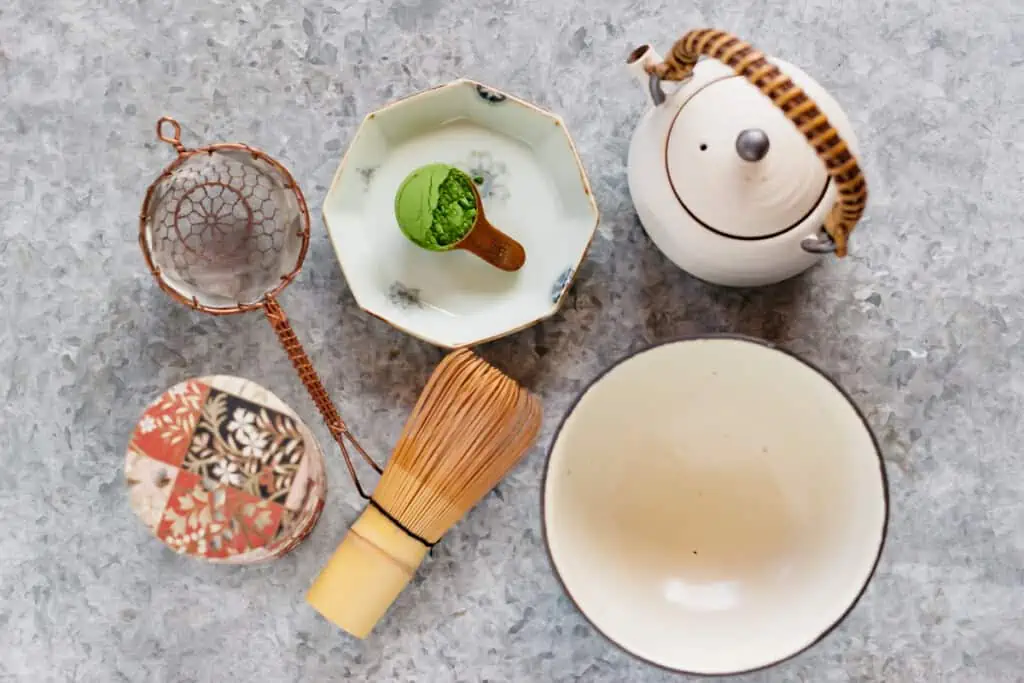 tea shifter, teaspoon, teapot, bamboo whisk, and tea bowl