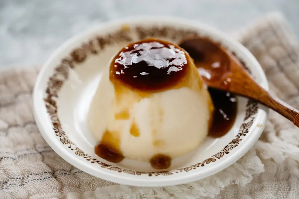 creme caramel served out of mold and mock caramel sauce drizzled over 