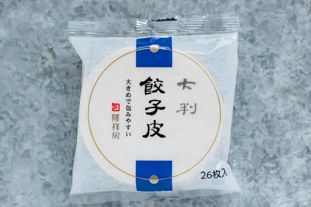 A gyoza wrappers om a packet bought from a shop